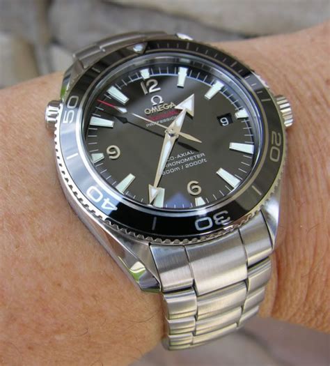 montre omega seamaster planet ocean liquidmetal edition limité|omega planet ocean set.